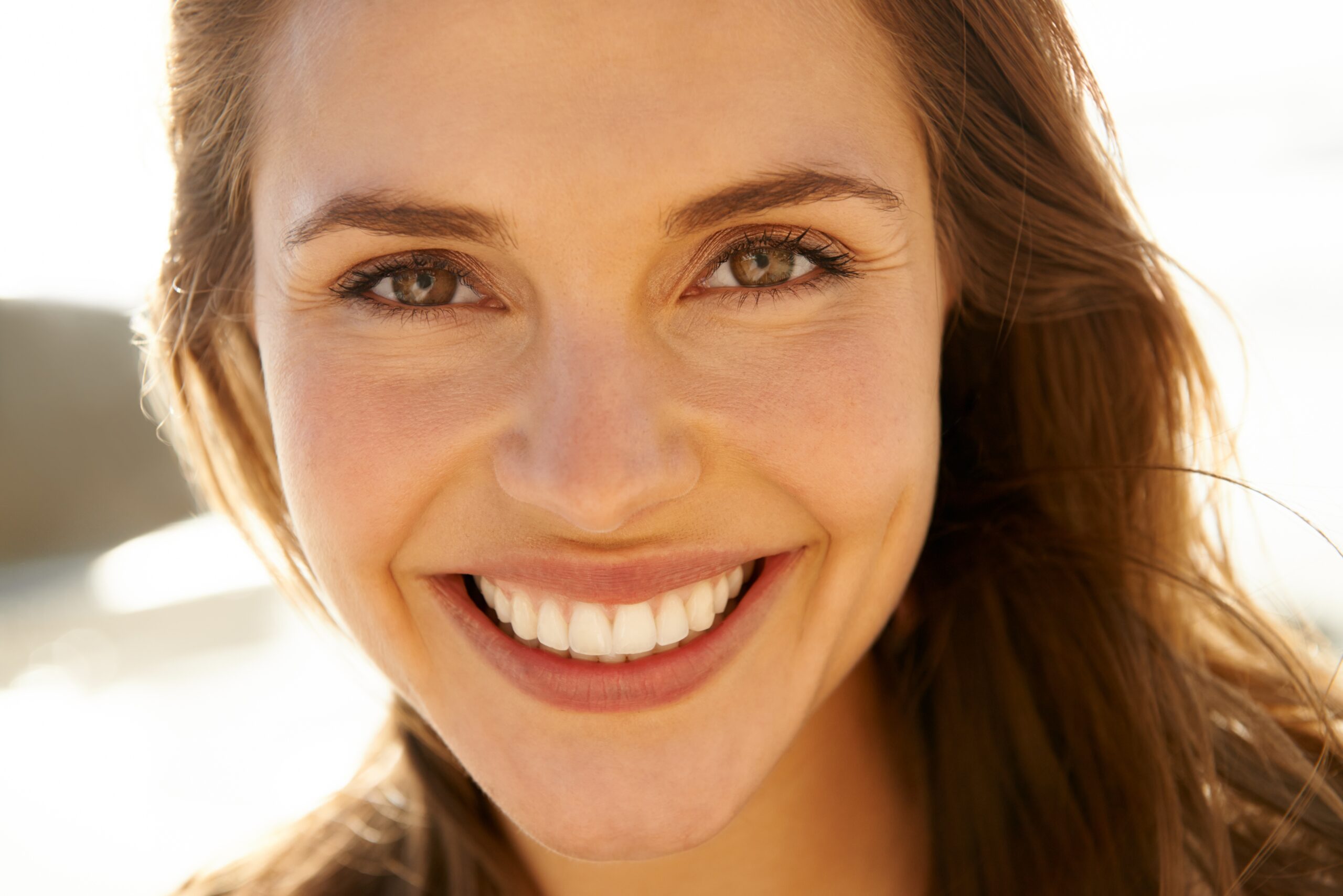 Happy person smiling with bright teeth